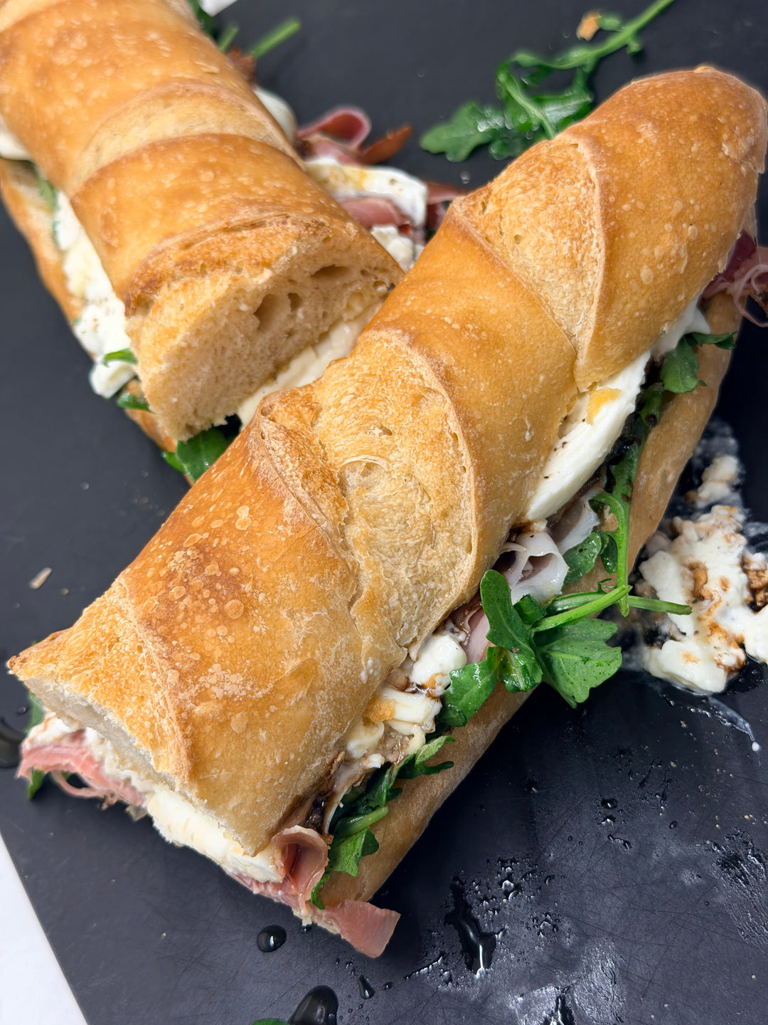 Grilled Peach, Burrata & Prosciutto Sandwich with Hot Honey